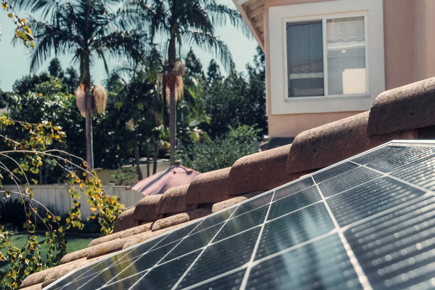 Solar panels on a tiled roof of a family home